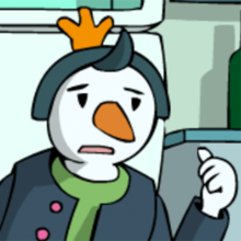 Das Pinguküken zeigt auf die Gefriertruhe.